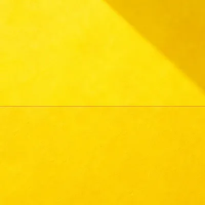 Bright Yellow Minimalist Background with Soft Shadow