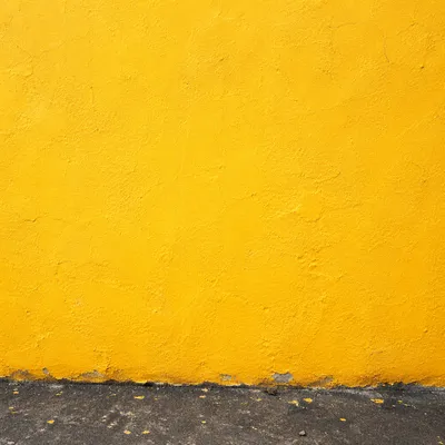 Bright Yellow Stucco Wall Background