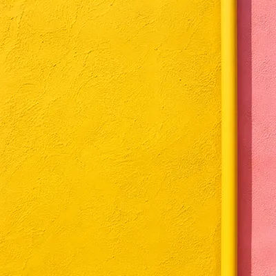 Bright Yellow Stucco Wall Background