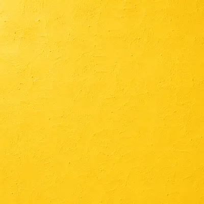 Bright Yellow Textured Wall Background