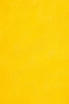 Bright Cheerful Yellow Stucco Background