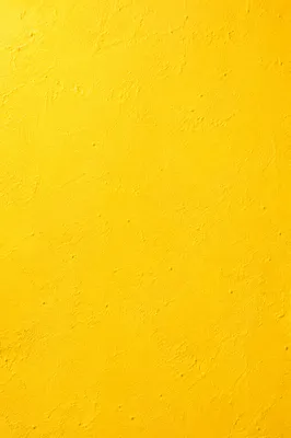 Bright Yellow Textured Wall Background