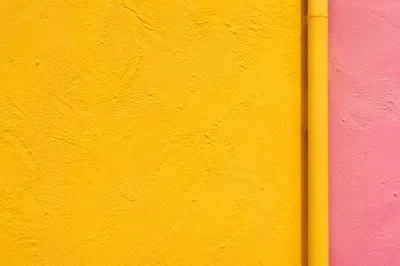 Bright Yellow Stucco Wall Background