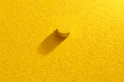 Bright Yellow Textured Background with Shadow