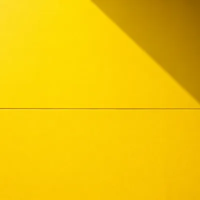 Bright Yellow Minimalist Background with Soft Shadow