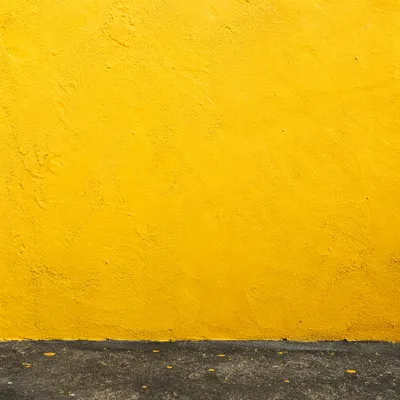 Bright Yellow Stucco Wall Background