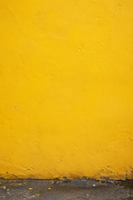 Bright Yellow Stucco Wall Background