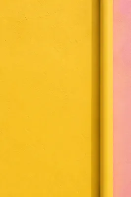 Bright Sunflower Yellow Stucco Wall Background