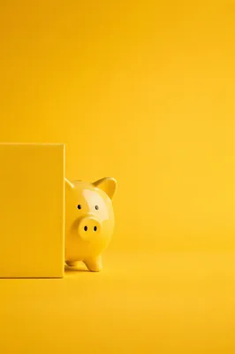 Cheerful Yellow Piggy Bank Background