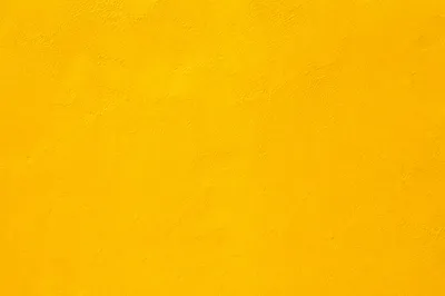 Bright Yellow Plaster Wall Background