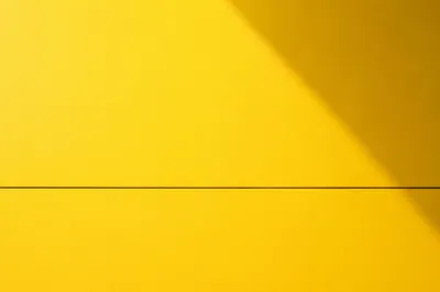 Bright Yellow Minimalist Background With Soft Shadow
