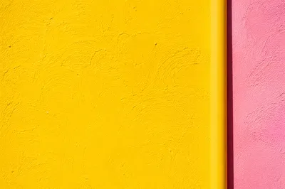 Bright Yellow Stucco Wall Background