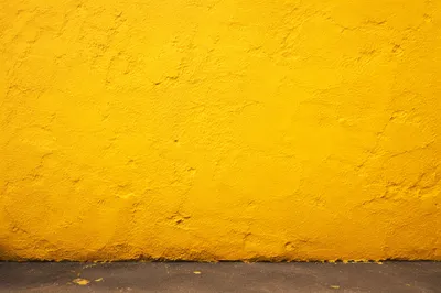 Bright Cheerful Yellow Stucco Wall Background