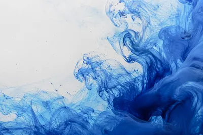 Abstract Blue Ink Swirls in Water