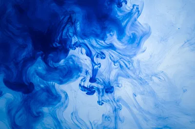 Blue Ink Swirls in Luminous Water
