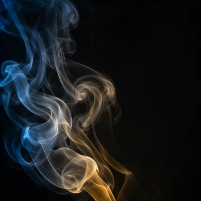 Elegant Smoke Wisps on Black Backdrop