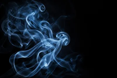 Blue Smoke Wisps on Black Background