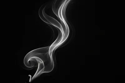 Elegant White Smoke Wisps on Black