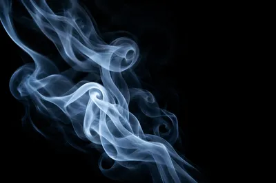 Elegant Blue Smoke Wisps on Black
