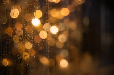 Warm Golden Bokeh Lights Background at Dusk