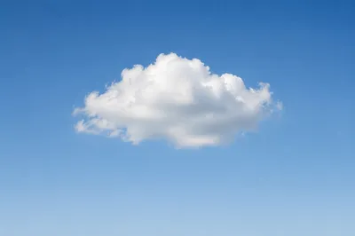 Peaceful Blue Sky With Soft White Cloud