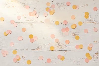 Pastel Confetti on White Wooden Background