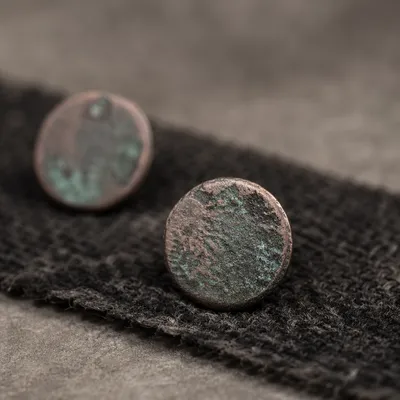 Aged Copper Patina on Dark Fabric