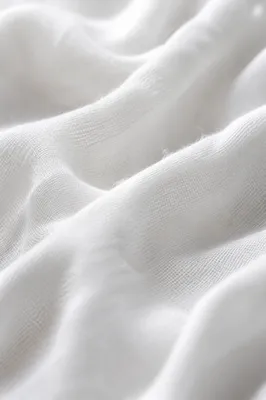 Soft White Cotton Folded Fabric Background