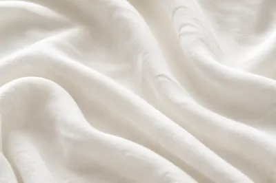 Soft White Cotton Folded Fabric Background