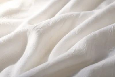 Soft White Cotton Folded Fabric Background