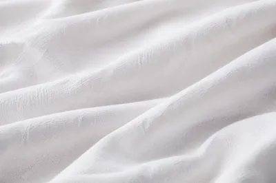 Soft White Cotton Folded Fabric Background