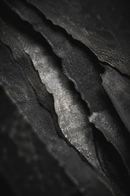 Dark Charcoal Torn Paper Texture Background