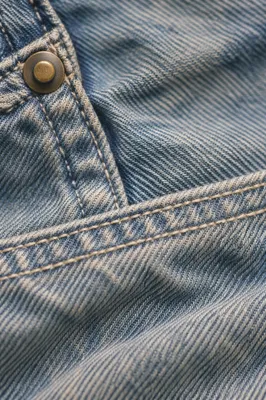 Faded Blue Denim Fabric Macro Background