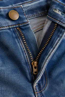 Macro Blue Denim Texture with Brass Zipper