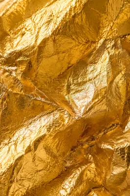 Luxurious Crinkled Gold Foil Texture Background
