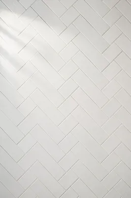 Clean White Herringbone Tile Background