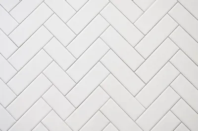 Clean White Herringbone Tile Background