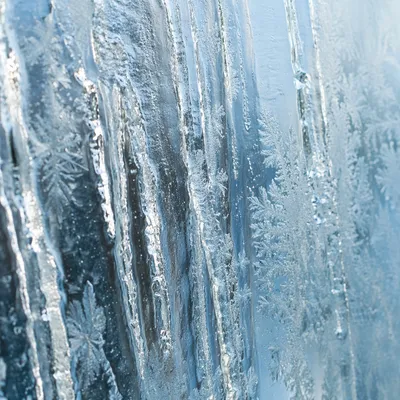 Winter Frost Crystals on Glass Background