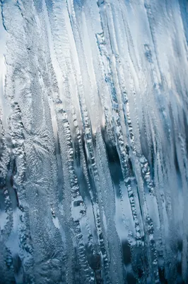 Glowing Winter Frost Patterns on Glass
