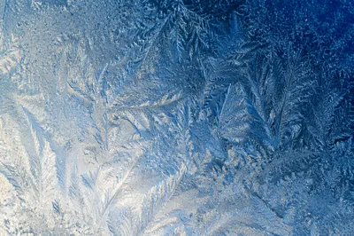 Winter Frost Crystals on Glass Texture