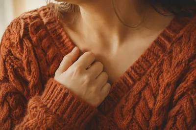 Cozy Rust Cable Knit Sweater Texture