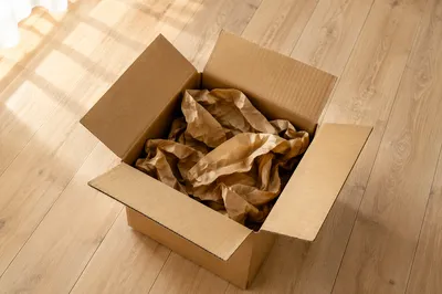 Recycled Kraft Paper in Open Cardboard Box