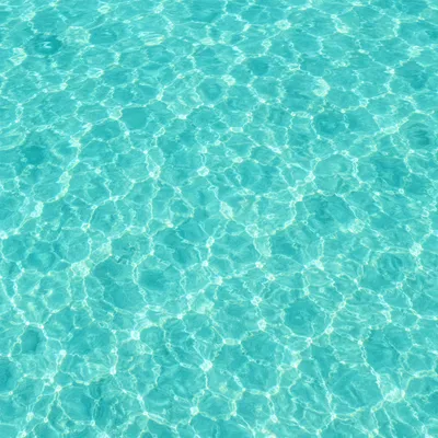 Serene Turquoise Ocean Ripple Background