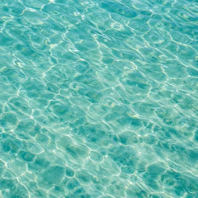 Turquoise Ocean Ripple Texture Background
