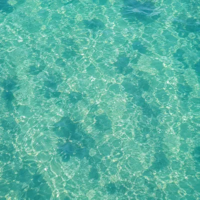 Calm Turquoise Ocean Ripple Background