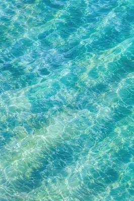 Turquoise Ocean Ripple Texture Background