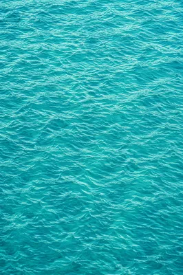 Turquoise Ocean Ripple Texture Background