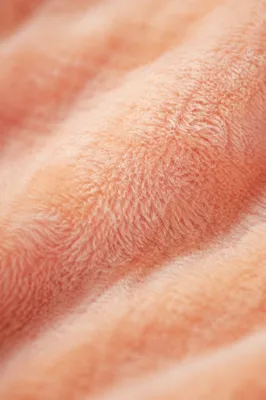 Peach Fuzz Velvet Texture Background