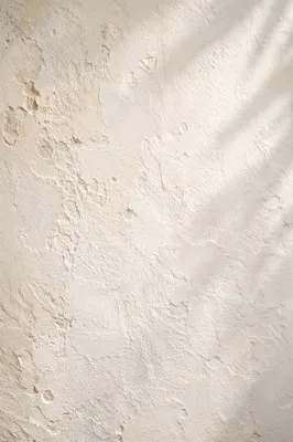 Sunlit Mediterranean White Plaster Wall Texture