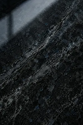 Polished Dark Granite Texture Background